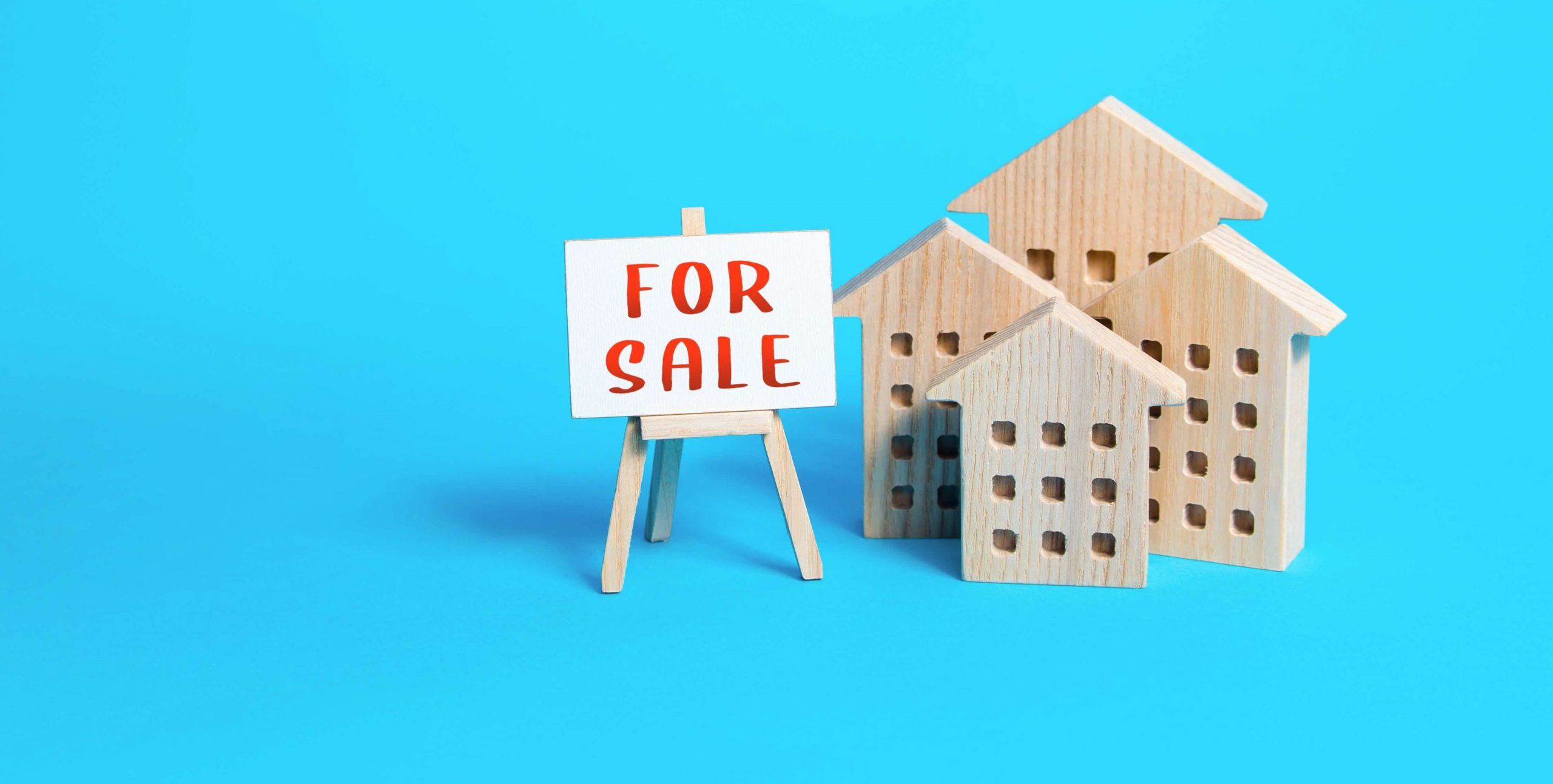 houses-and-for-sale-sign